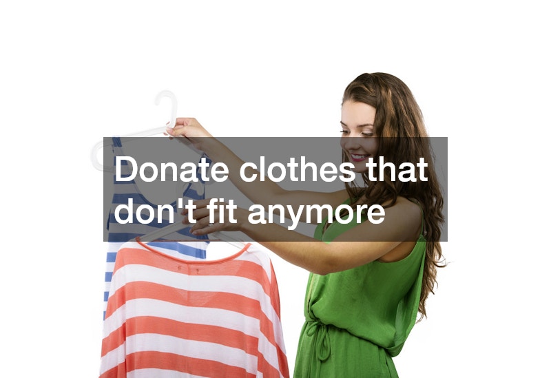 woman deciding which shirt to donate